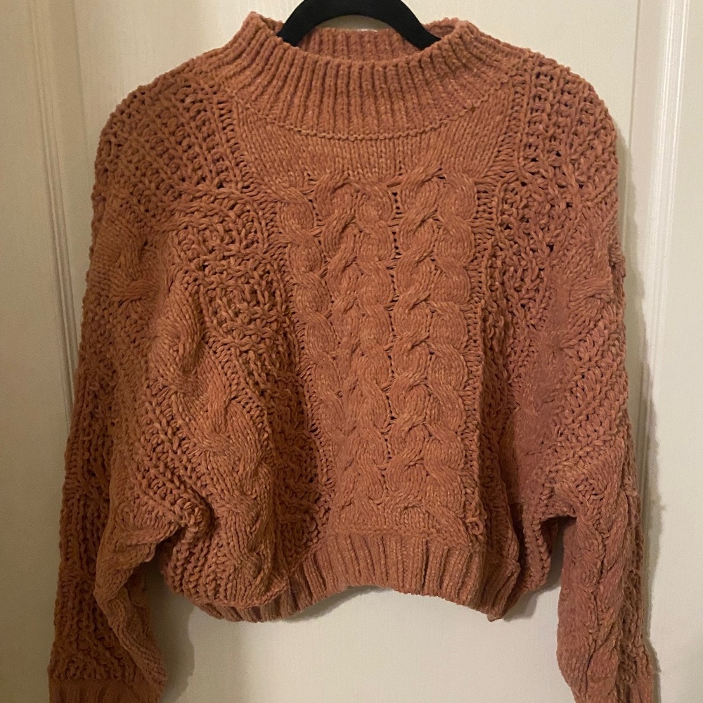 Pink turtleneck sweater